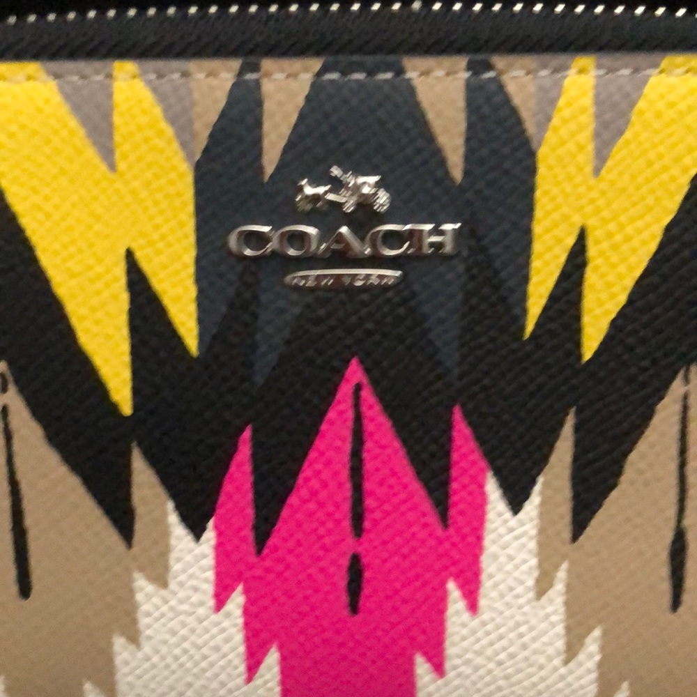 Beautiful Coach wristlet and matching Coach bracelet